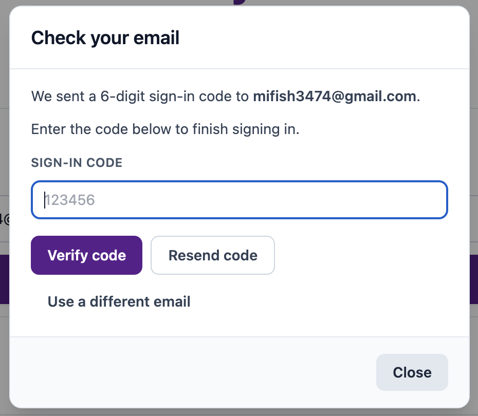 Check your email dialog with sign-in code field, Verify code button, Resend code button, and Use a different email option.